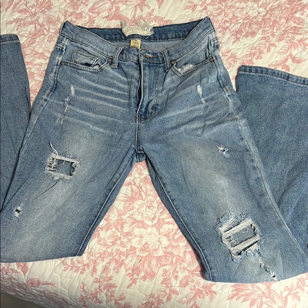 Distressed Light Wash Denim Jeans